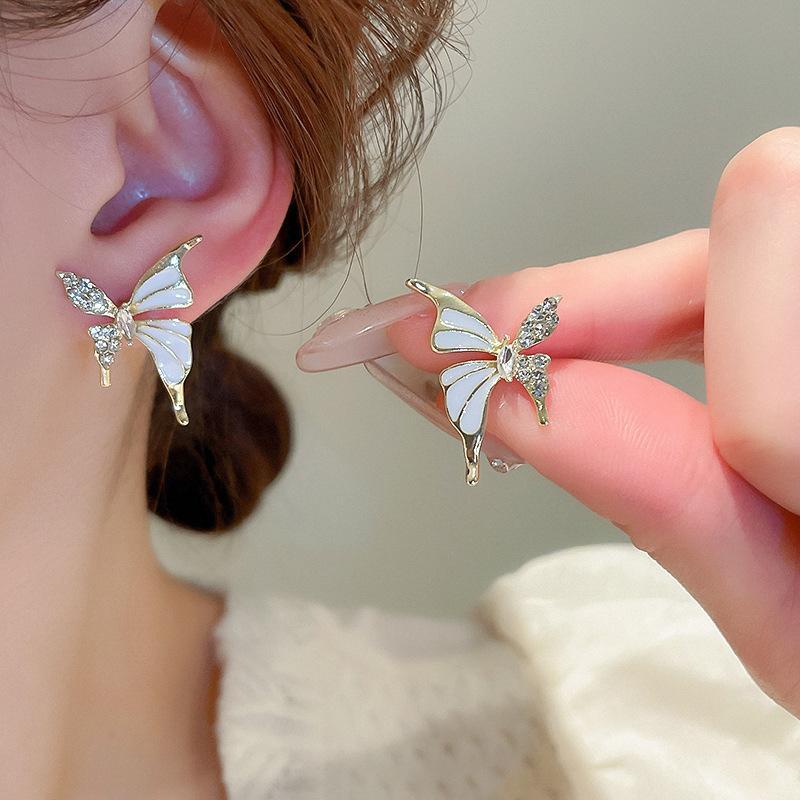 Butterfly Design Gold Plated Artificial Stones Dangling Earrings
